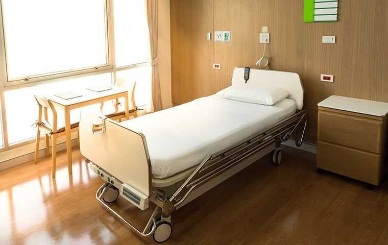 an empty hospital bed 