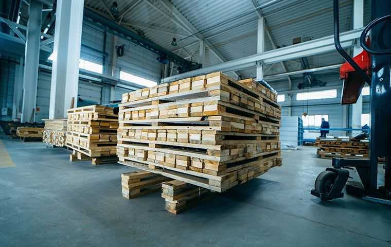 wood stacked in a warehouse